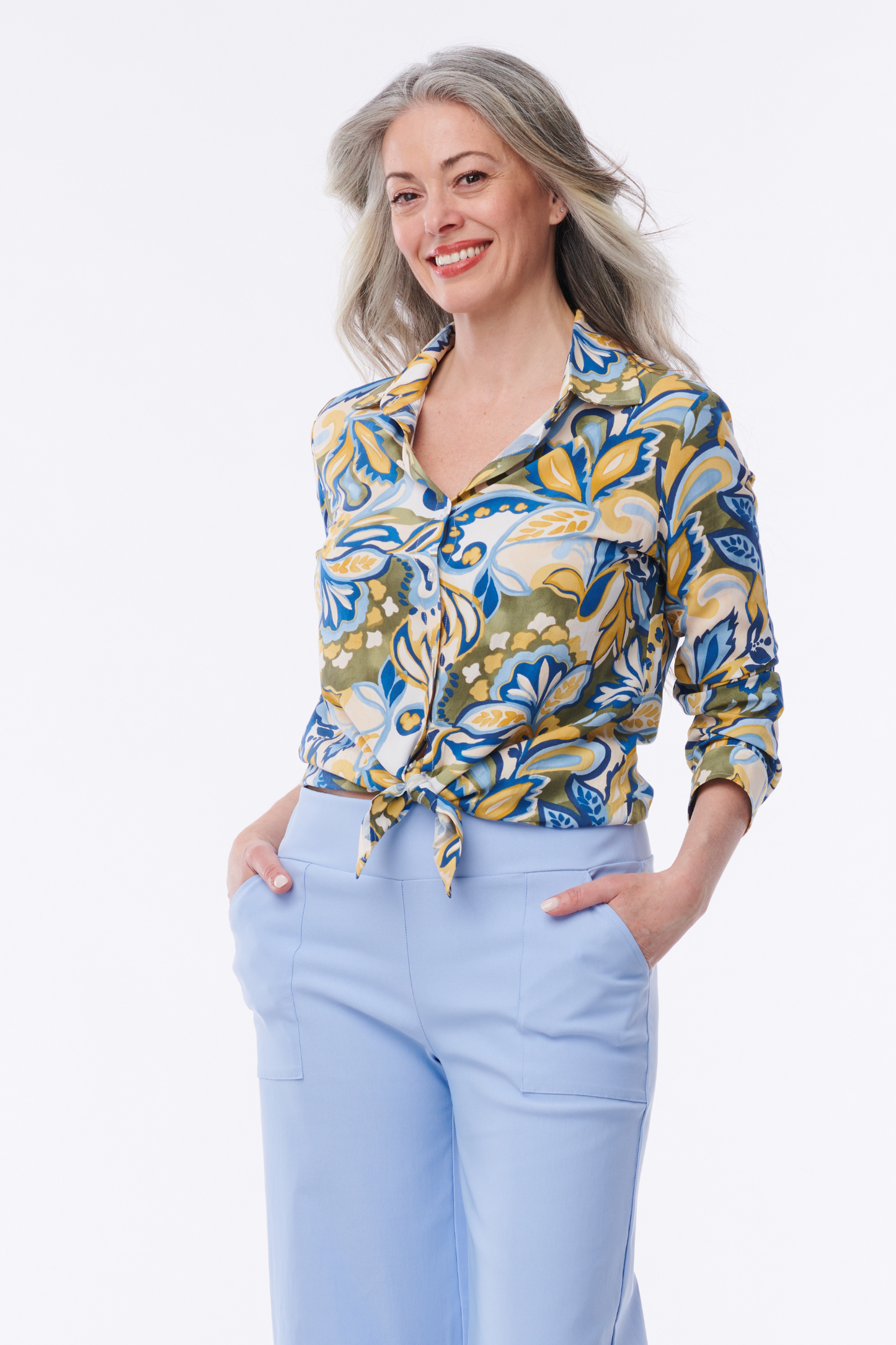Helene Clarkson Design Amalfi printed button-down blouse featuring vibrant floral patterns and lightweight fabric.