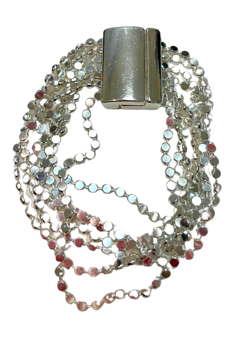 Silver MERX strand bracelet with adjustable clasp, featuring layered beaded design, on a neutral background.