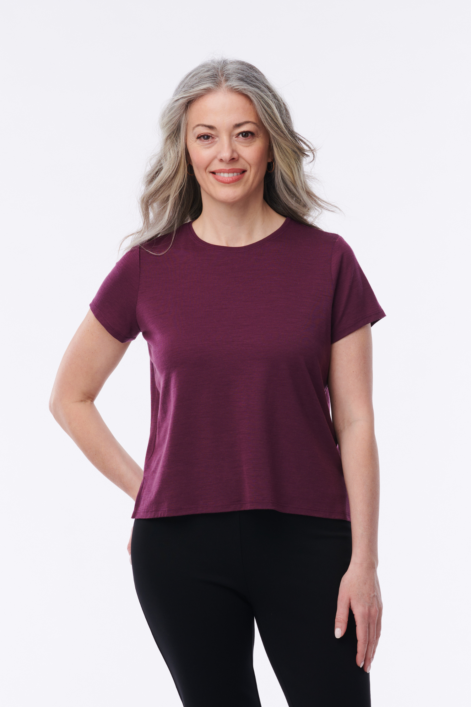 Helene Clarkson Design Albi 100% Merino short sleeve top in soft, natural wool with a fitted crew neck and smooth fabric texture.