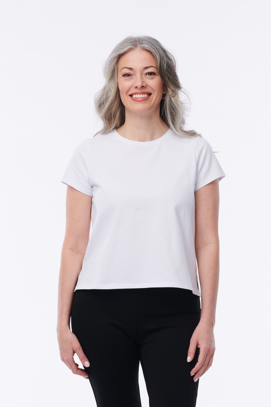 Helene Clarkson Design Albi Cotton T-Shirt, casual white shirt with a crew neckline, displayed on a hanger.