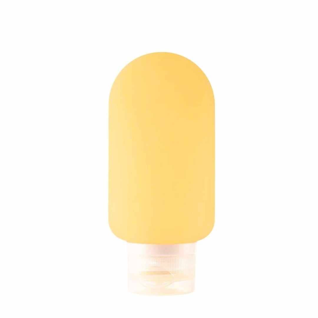 Silicone travel bottle by The Green Jar, reusable waterproof accessory for liquids, compact and portable for on-the-go use.