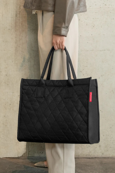 Reisenthel Daily Shopper bag in black with rhombus pattern, durable fabric tote with handles for daily errands and shopping.