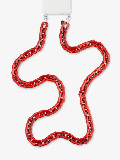 A pair of large, wavy chain-link drop earrings in a glossy red finish, suspended from silver-toned rings against a plain white background.