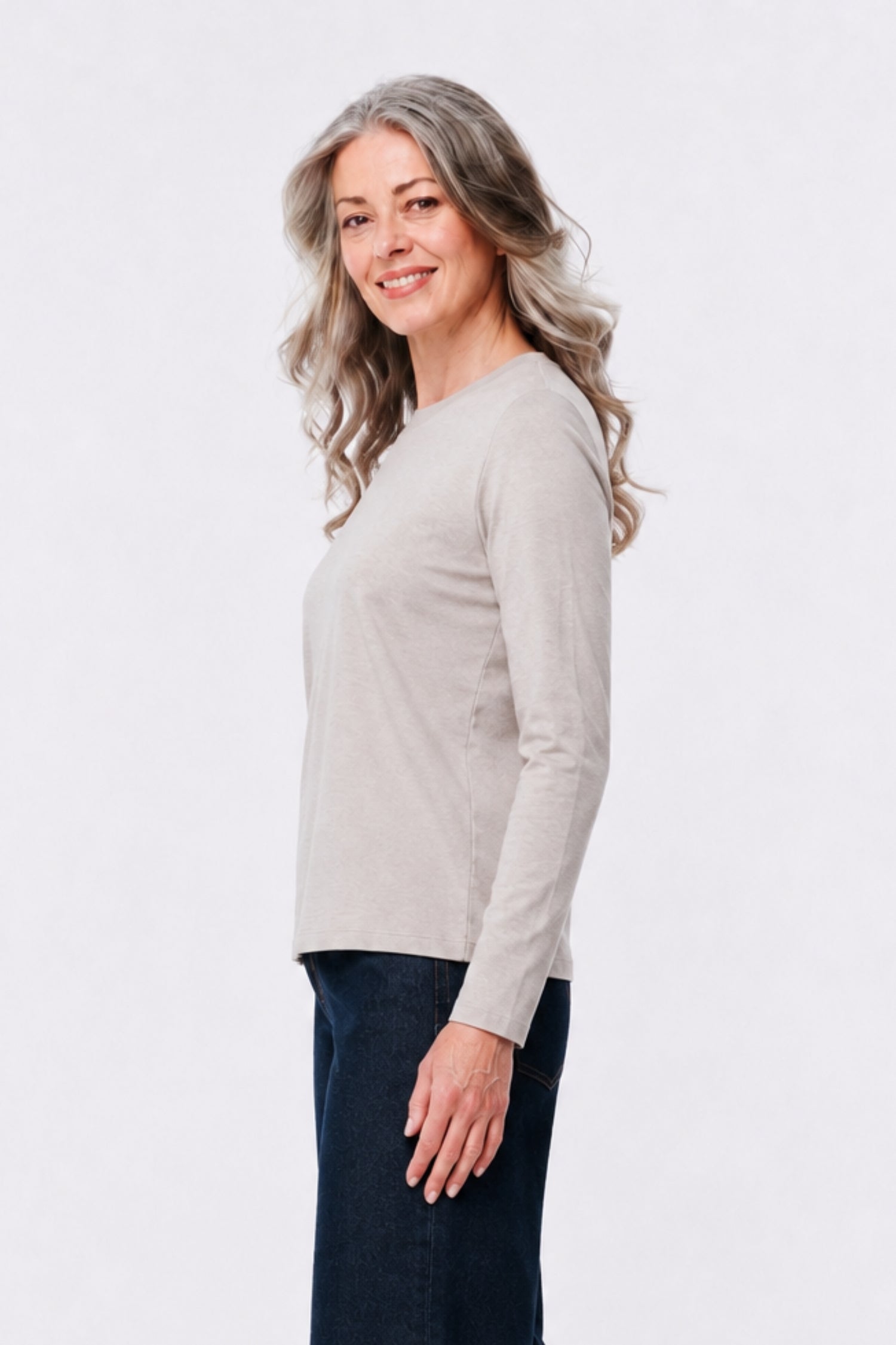 Model wearing the Albi 100% Merino Wool Long Sleeve Top in Vapor, side view