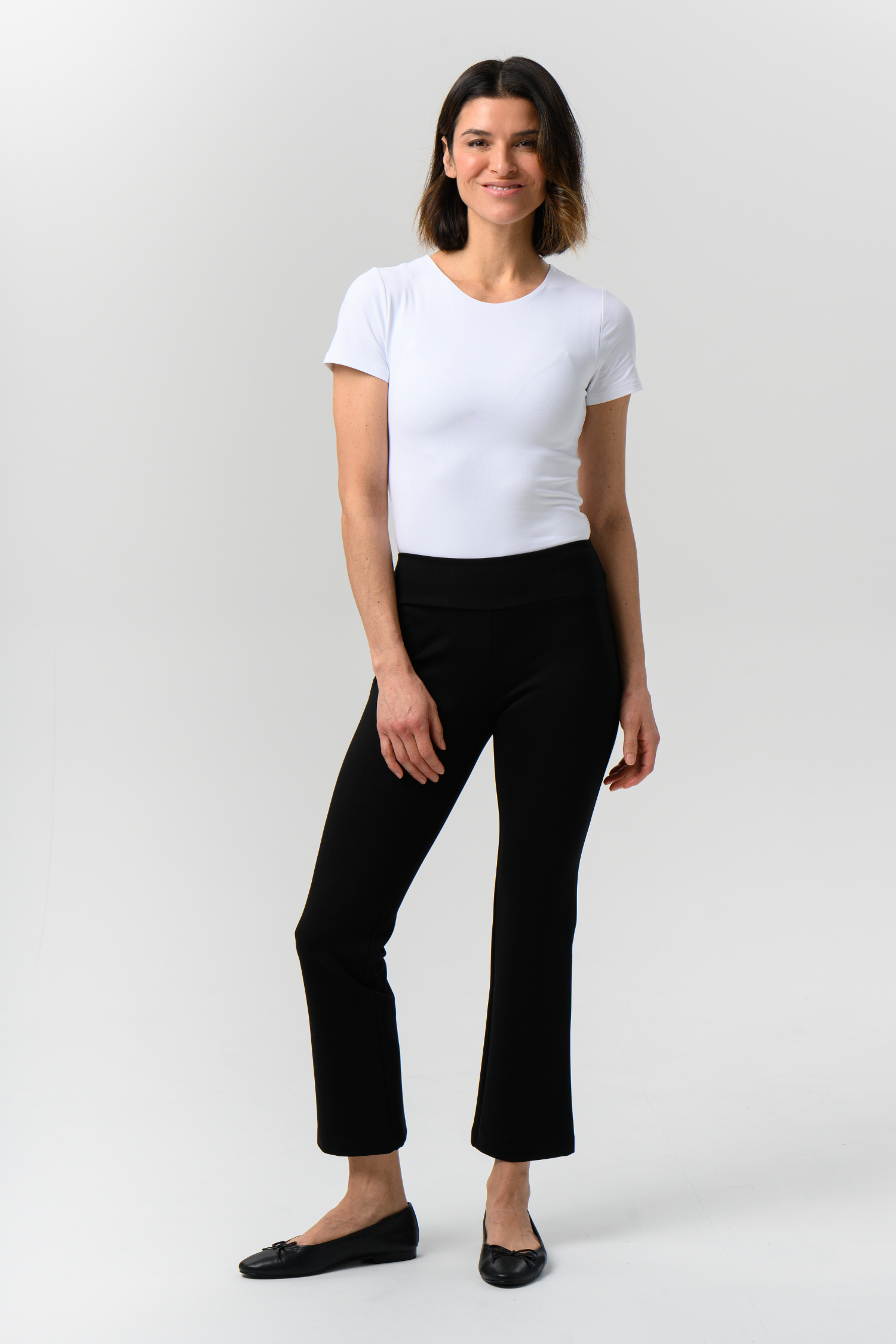 Reversible kick flare travel pants by Helene Clarkson Design, showing both sides of the stylish, versatile pants.