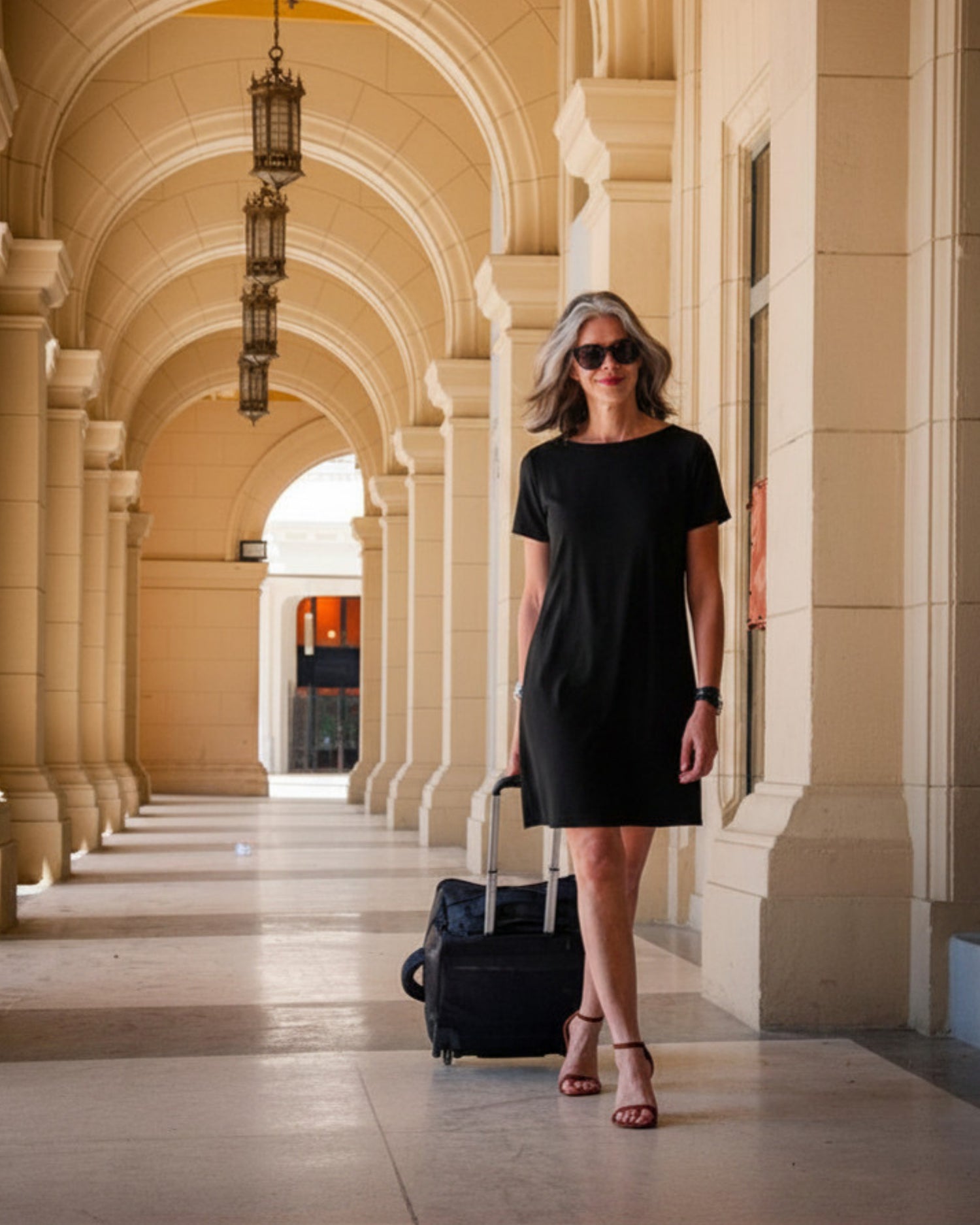 Sophisticated woman wearing Helene Clarkson travel clothing