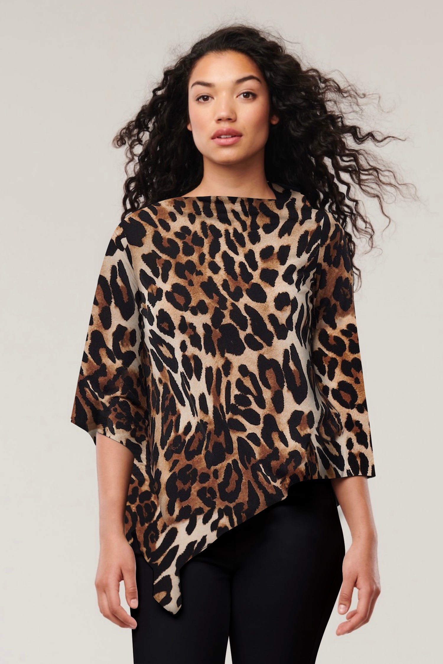 Leopard print Nadi 8-in-1 travel scarf by Helene Clarkson Design, versatile and stylish scarf with multiple wrap options.