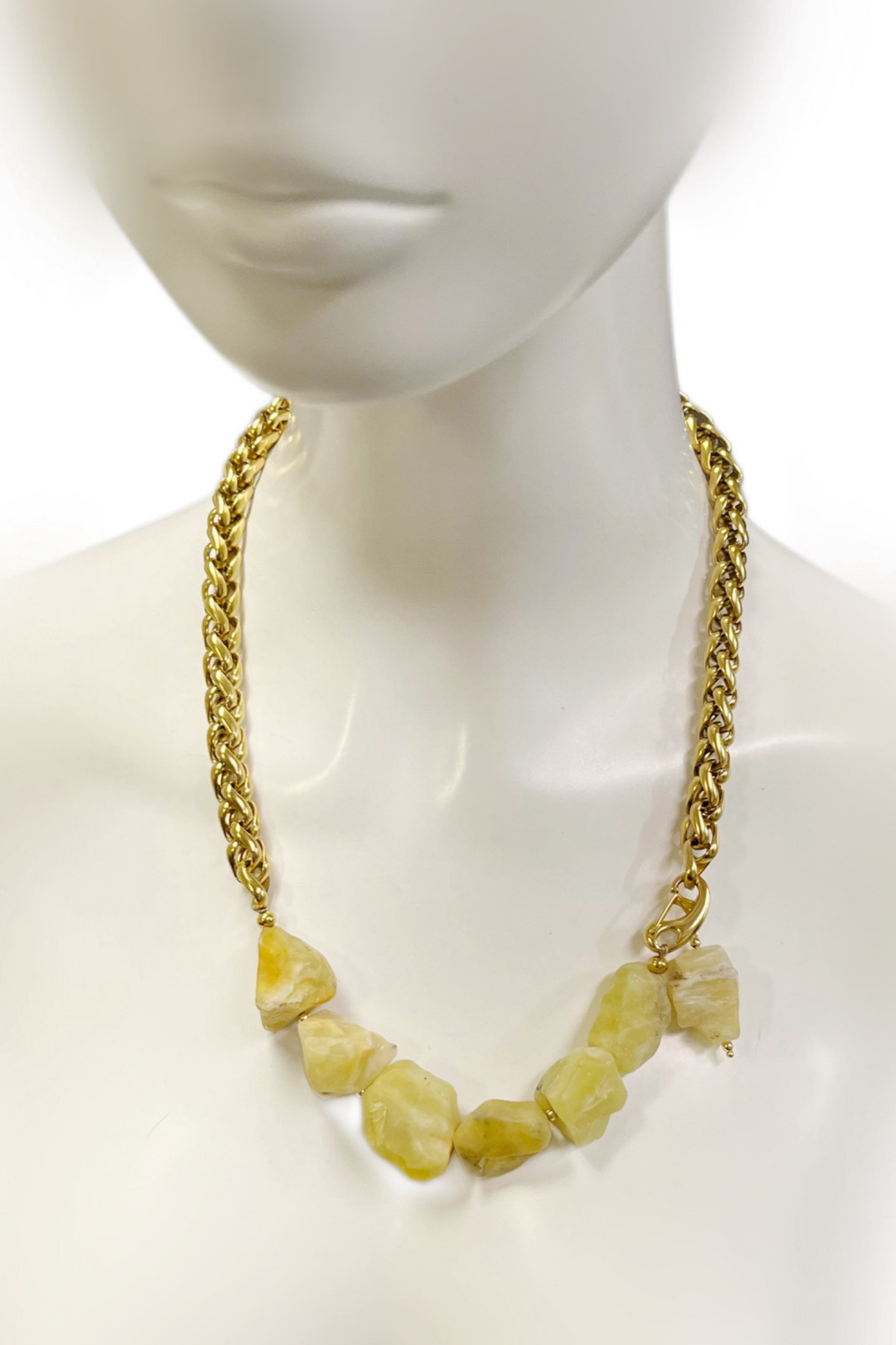 Unbalanced necklace featuring unpolished yellow opal and gold-plated stainless steel by Iberina Design.