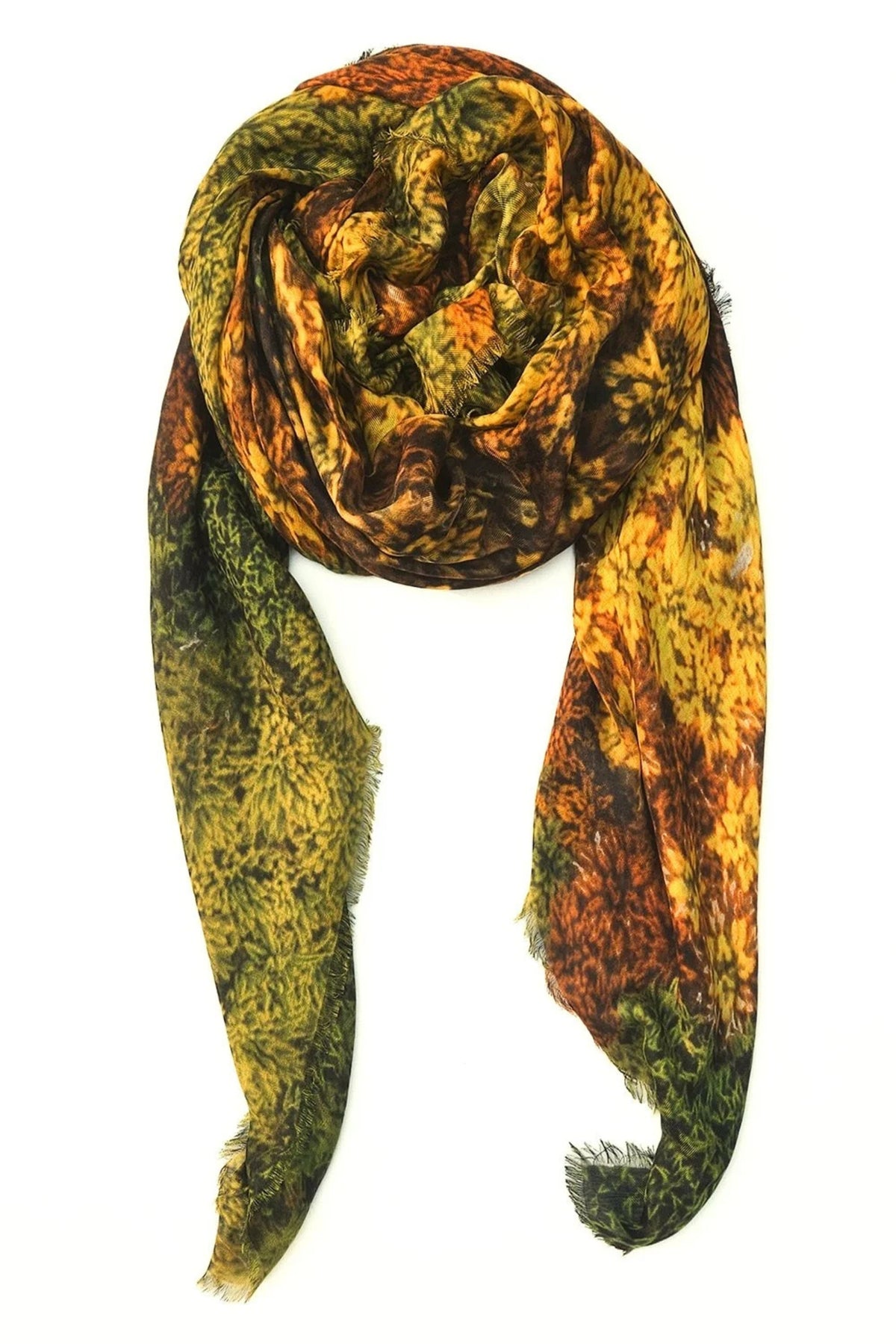 A lightweight scarf with a mottled, marbled pattern in olive green, yellow, orange, and brown, draped against a solid white background.