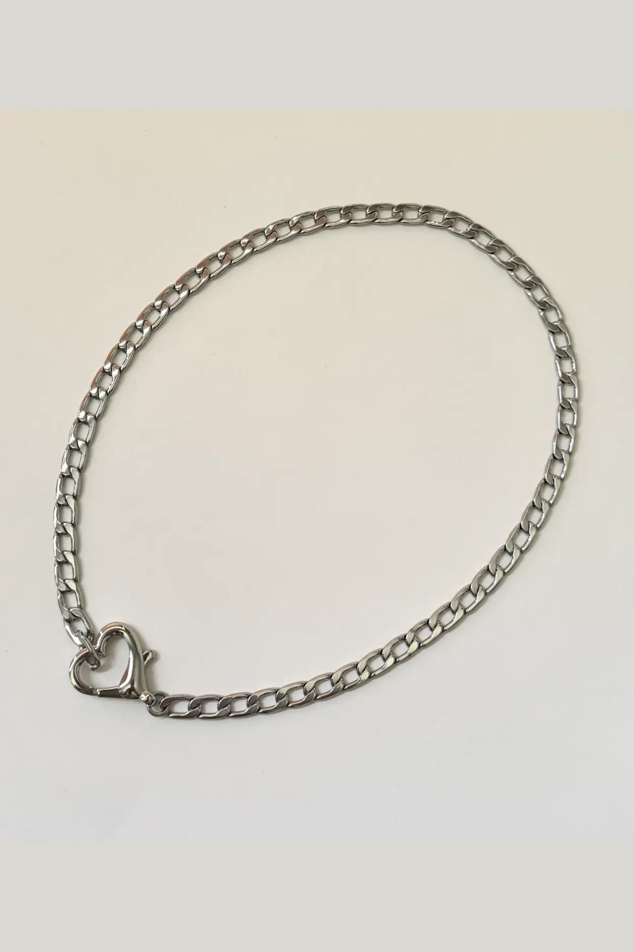 Gold Saiba Heart Clasp Necklace from Namaste Jewelry featuring a delicate heart-shaped clasp and elegant jewelry design.