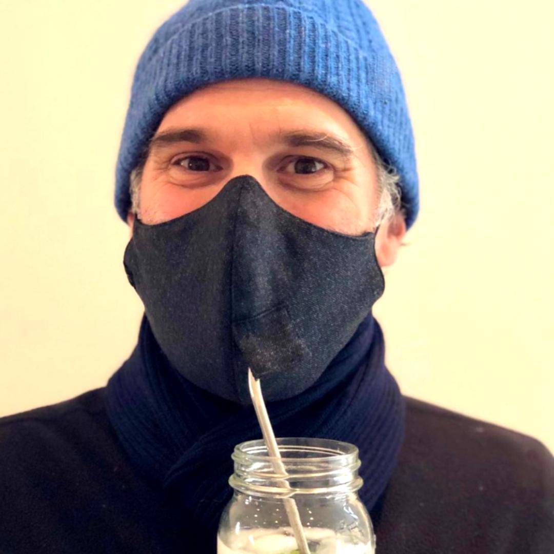 Charcoal denim travel and sip face mask for adults by Helene Clarkson Design, showing comfortable fit and stylish design