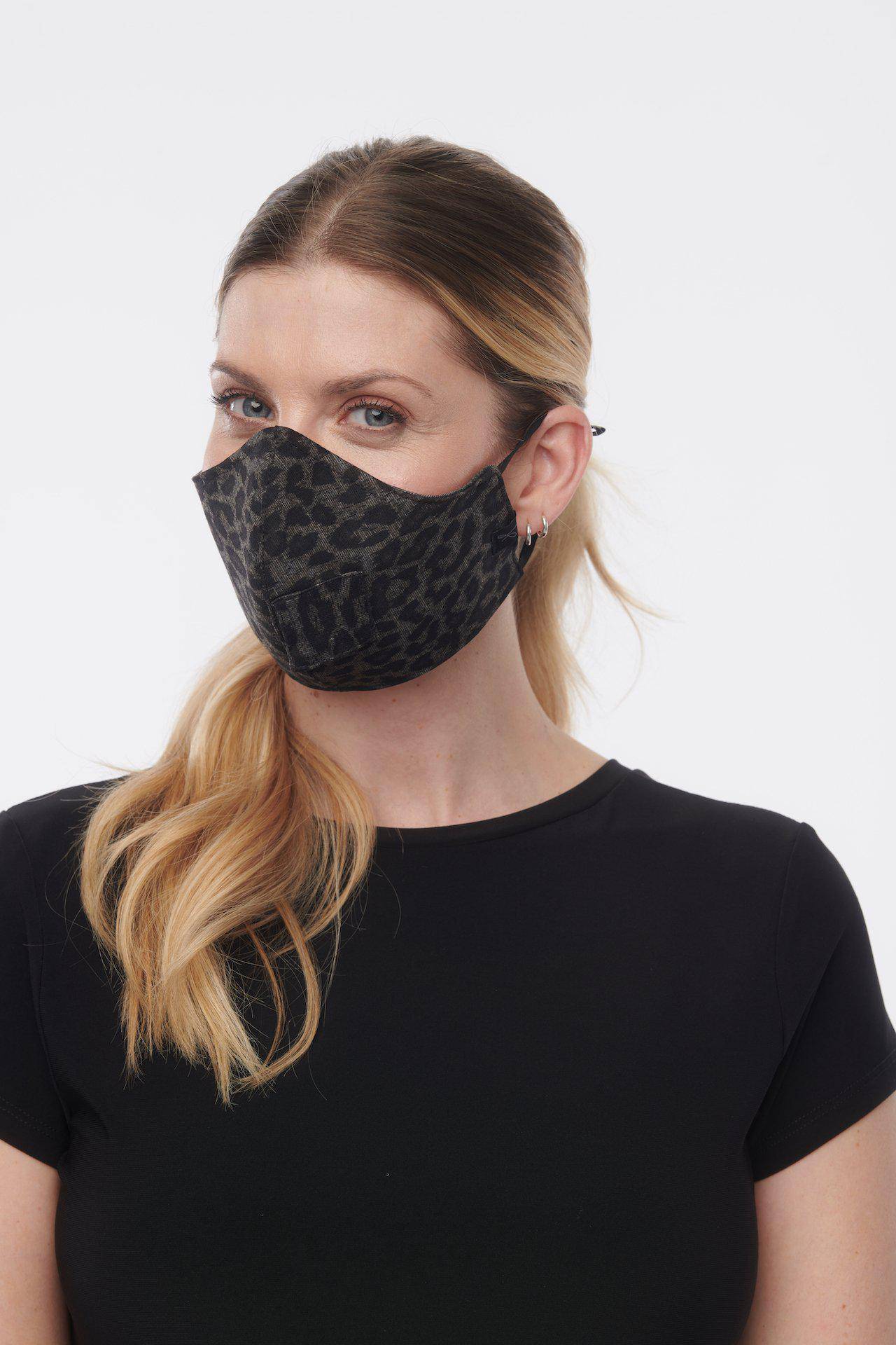 Charcoal denim travel and sip face mask for adults by Helene Clarkson Design, featuring adjustable ear loops and breathable fabric.