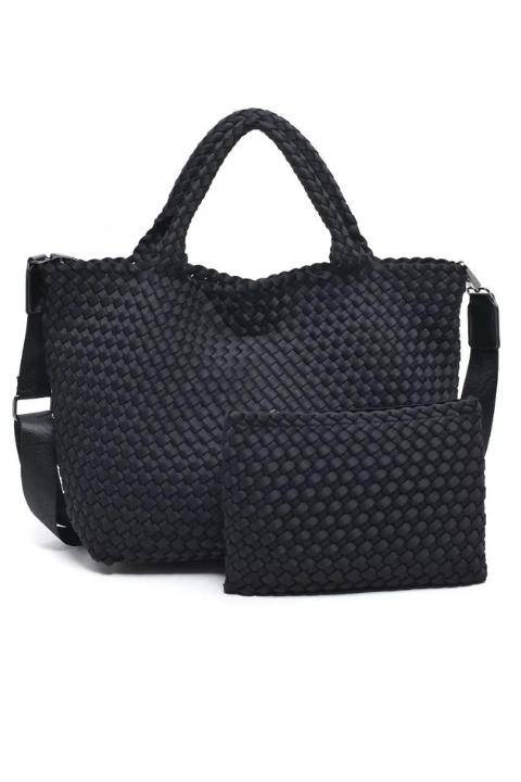 Fuchsia Sol and Selene Sky's The Limit medium woven neoprene tote bag with sturdy handles and spacious interior.
